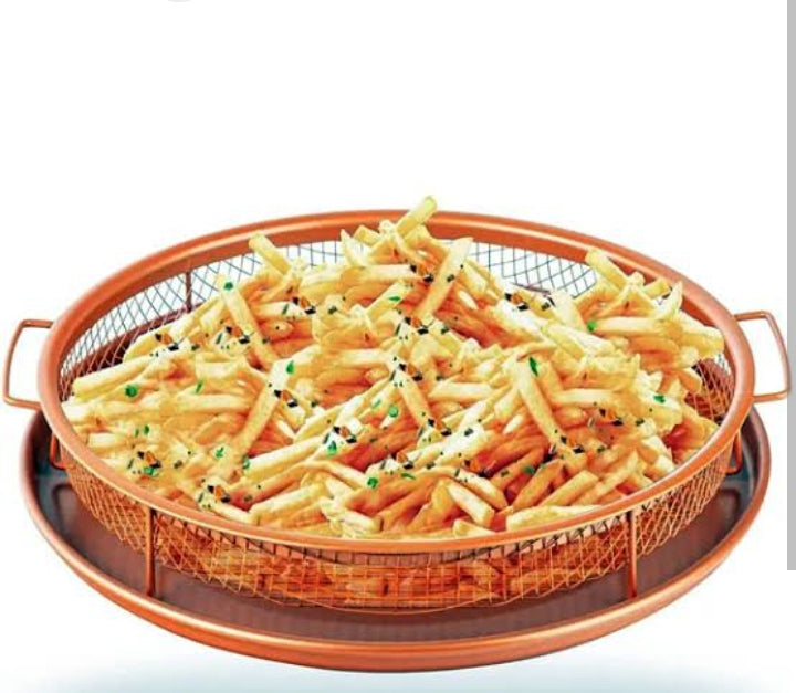 "No air fryer machine needed. Just this tray + basket = perfect crunch