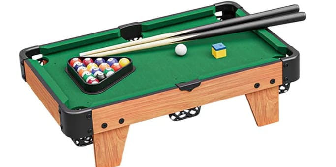 Pool Table Tabletop Game brings family fun right to your living room.