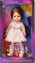 JELENA Best Friend Doll wears a pink lace dress with brown hair.