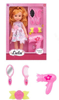 Lulu Doll wears a pink floral dress with sparkly top.